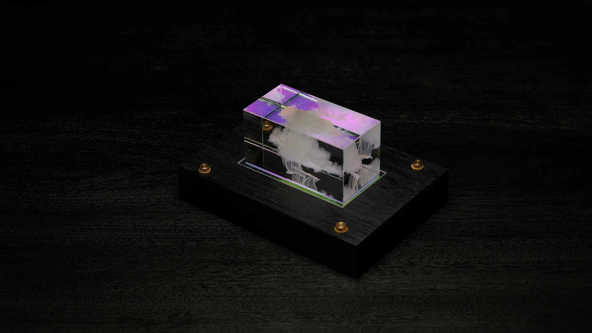 Somnium sculpture glowing violet, top three-quarter view